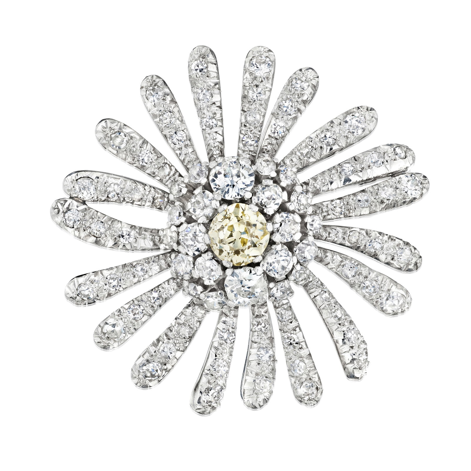 A DIAMOND BROOCH: A DIAMOND BROOCH Designed as a daisy, set throughout with old mine, old European and single-cut diamonds; estimated total diamond weight 3.80 carats; a few diamonds chipped; mounted in platinum;