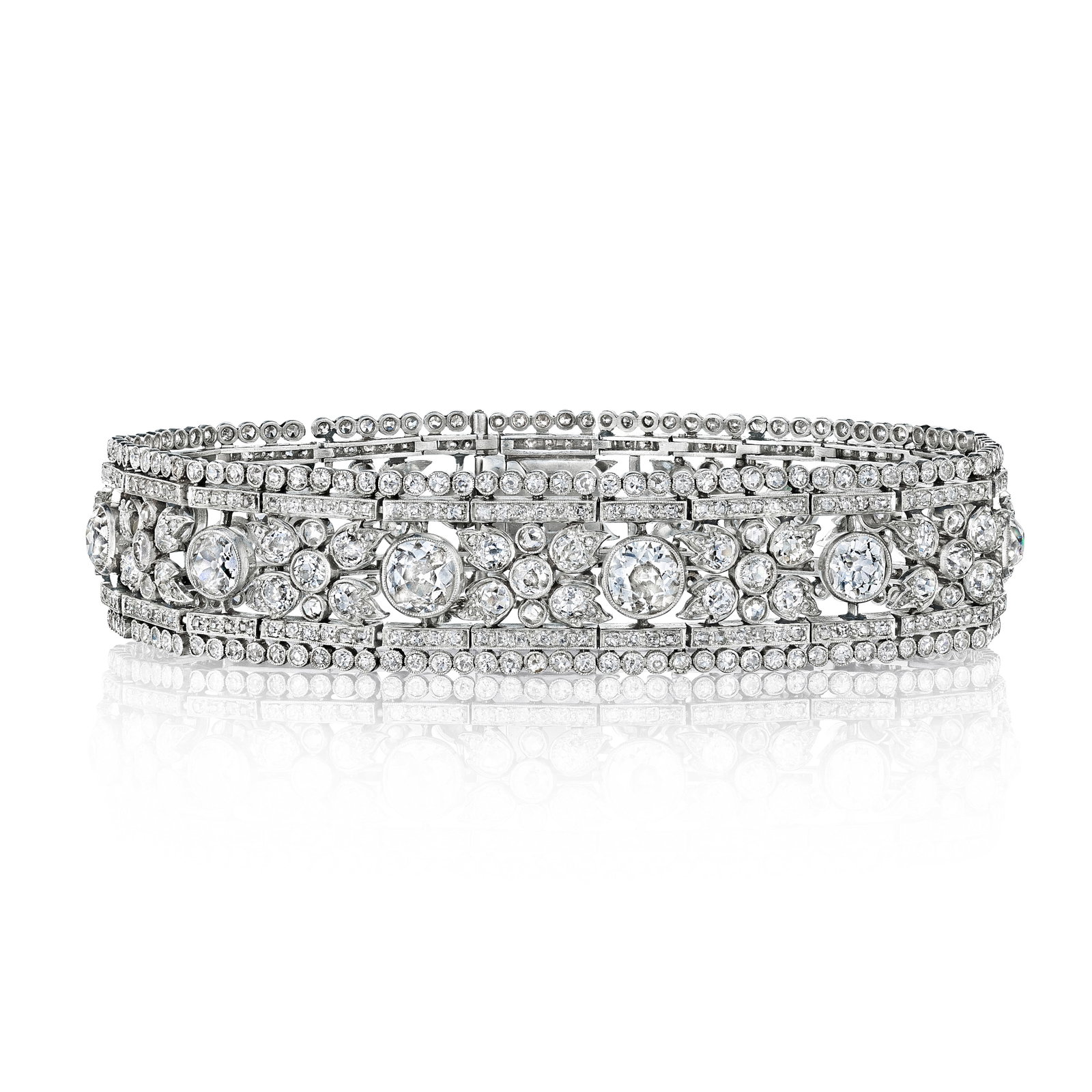 A BELLE ÉPOQUE DIAMOND BRACELET, FRANCE, CIRCA 1915: A BELLE ÉPOQUE DIAMOND BRACELET, FRANCE, CIRCA 1915 Composed of graduated old European-cut diamonds with interspersed foliate motifs of old European and rose-cut diamonds, within a double border
