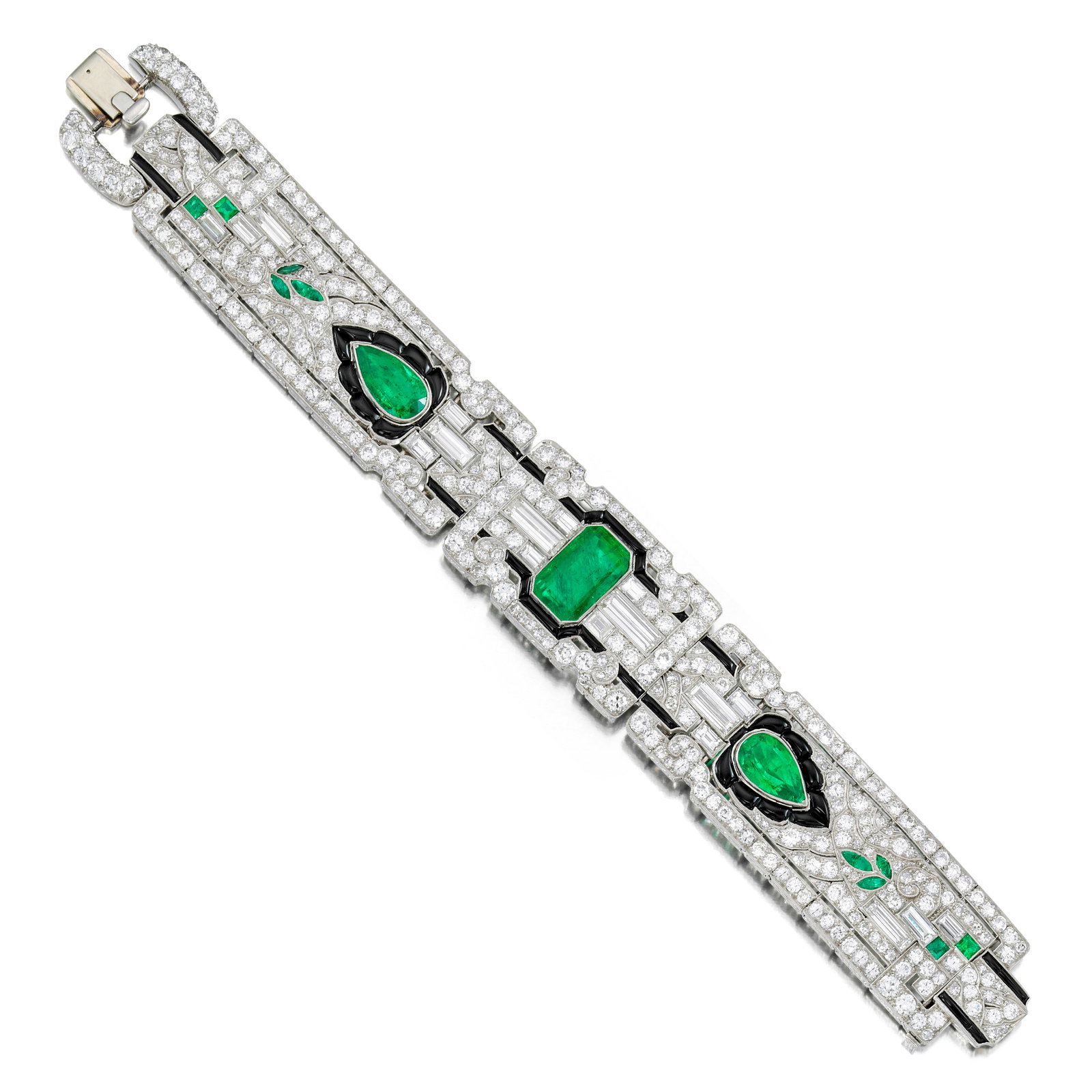 OSCAR HEYMAN FOR E.M. GATTLE & CO.: AN ART DECO EMERALD, ONYX AND DIAMOND BRACELET, CIRCA 1926: OSCAR HEYMAN FOR E.M. GATTLE & CO.: AN ART DECO EMERALD, ONYX AND DIAMOND BRACELET, CIRCA 1926 Of geometric silhouette with foliate patterns, centering an emerald-cut emerald flanked by two