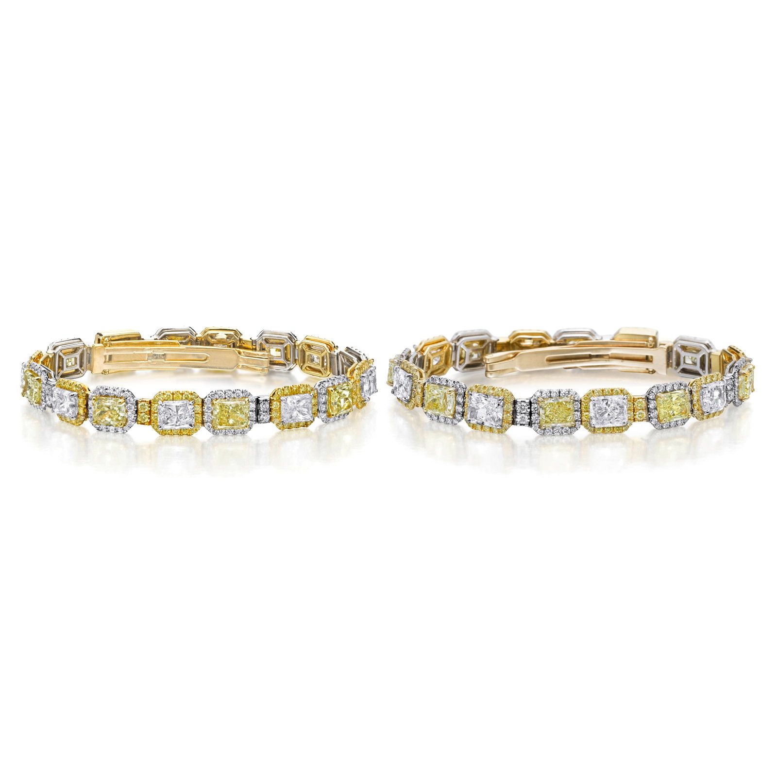 A PAIR OF COLORED DIAMOND AND DIAMOND BRACELETS: A PAIR OF COLORED DIAMOND AND DIAMOND BRACELETS Each composed of alternating sections of radiant-cut diamonds within a round brilliant-cut colored diamond surround, and radiant-cut colored diamonds