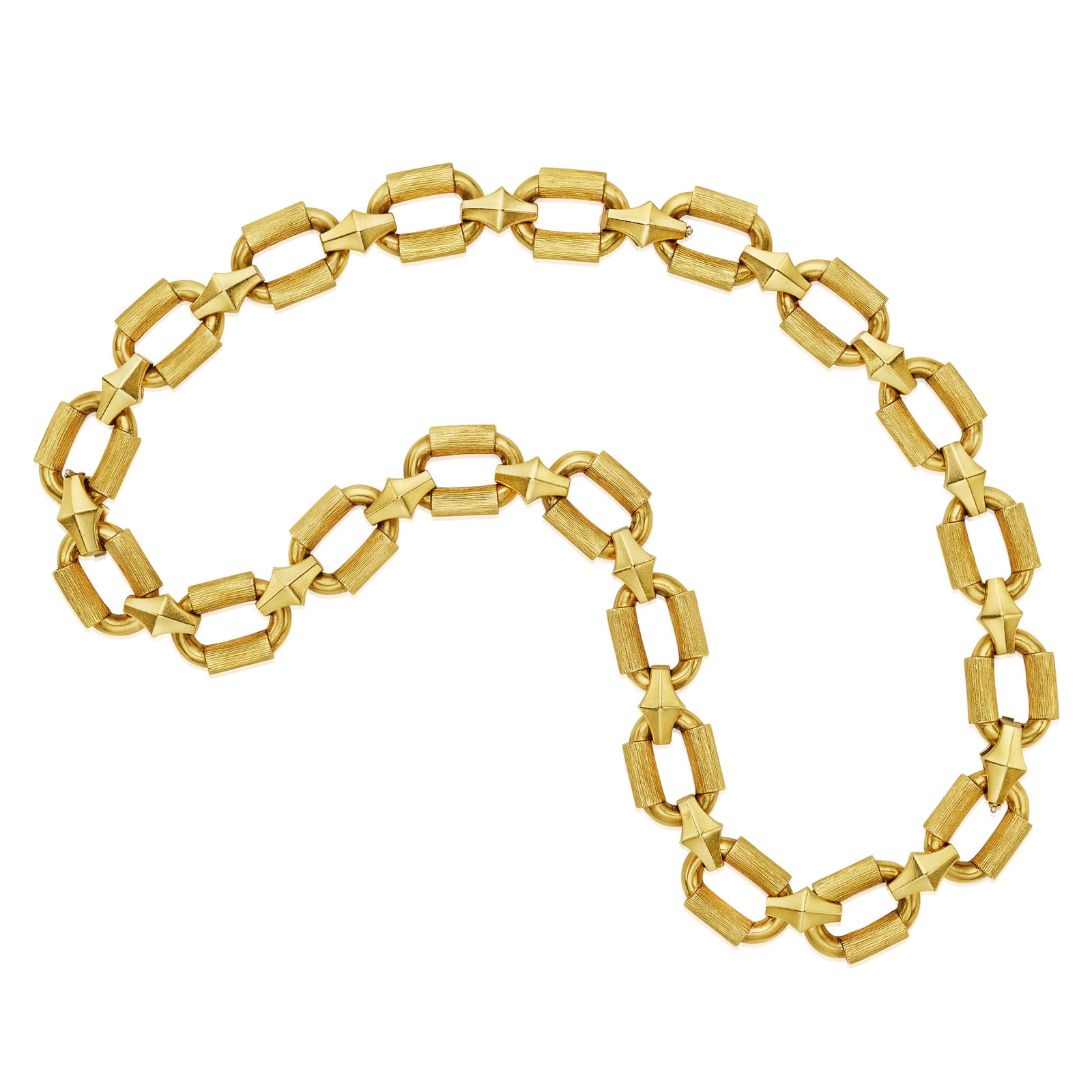 HENRY DUNAY: AN 18K GOLD CONVERTIBLE NECKLACE/BRACELET SET: HENRY DUNAY: AN 18K GOLD CONVERTIBLE NECKLACE/BRACELET SET Composed of repeating geometric links; convertible into a long necklace; signed DUNAY on the bracelet; mounted in 18K gold; gross