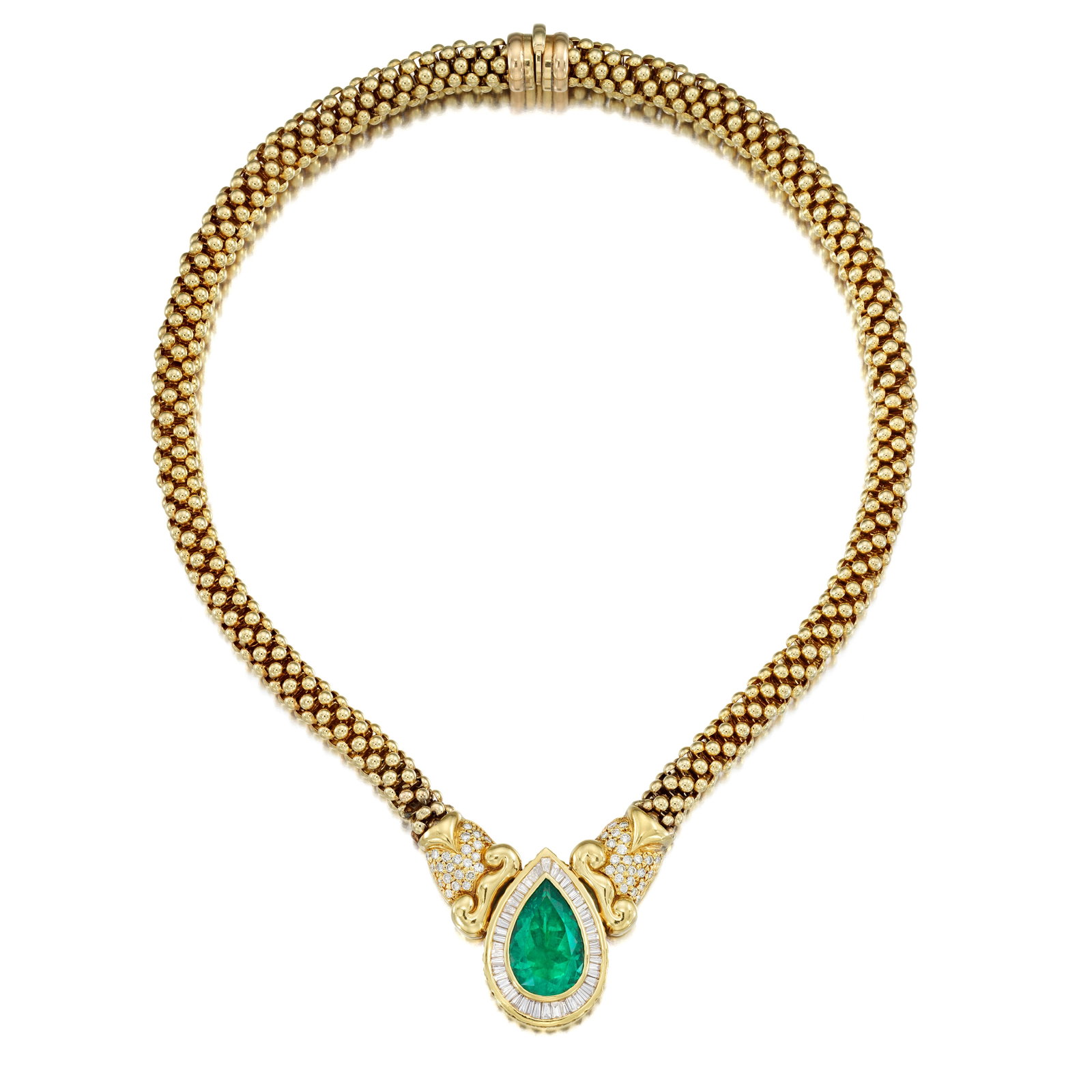 AN EMERALD AND DIAMOND NECKLACE: AN EMERALD AND DIAMOND NECKLACE Centering a pear-shaped emerald within a tapered baguette-cut diamond surround, to a popcorn chain with round brilliant-cut diamond-set connectors; estimated emerald