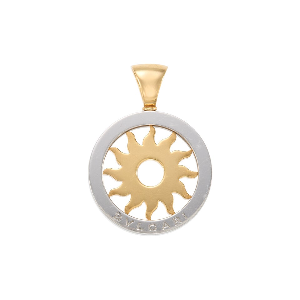 BULGARI: 18K GOLD AND STEEL PENDANT: BULGARI: 18K GOLD AND STEEL PENDANT • 18k yellow gold and steel • Signed BVLGARI • Measures 1 3/4 x 1 1/4 in. • Estimated gross weight: 11.8 grams Footnotes: Overall