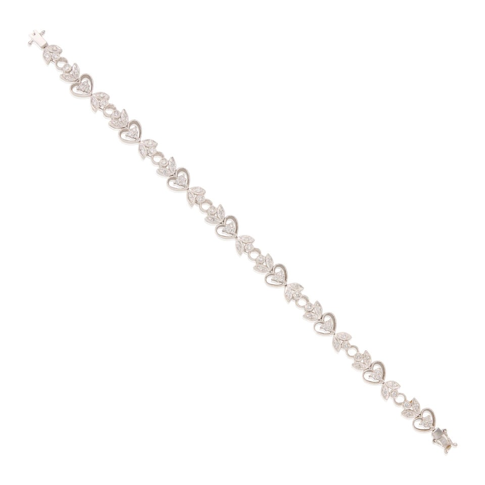 14K GOLD AND DIAMOND BRACELET: 14K GOLD AND DIAMOND BRACELET • 14K white gold • Numerous round brilliant cut diamonds weighing approximately 1.40 carats total • Length 7 in. • Estimated gross weight: 17.3