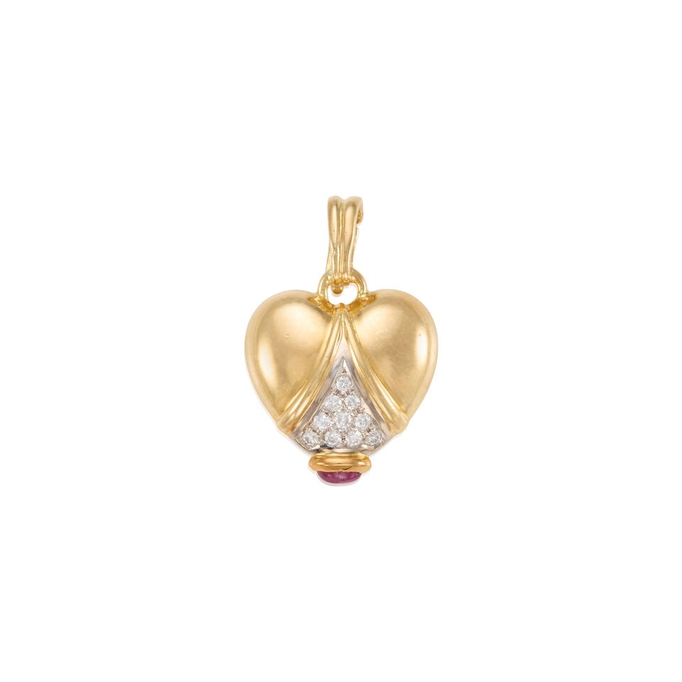 18K GOLD AND DIAMOND HEART ENHANCER PENDANT: 18K GOLD AND DIAMOND HEART ENHANCER PENDANT • 18k yellow and white gold • Numerous round diamonds weighing approximately 0.10 - 0.20 carat total • 1 oval cabochon ruby measuring