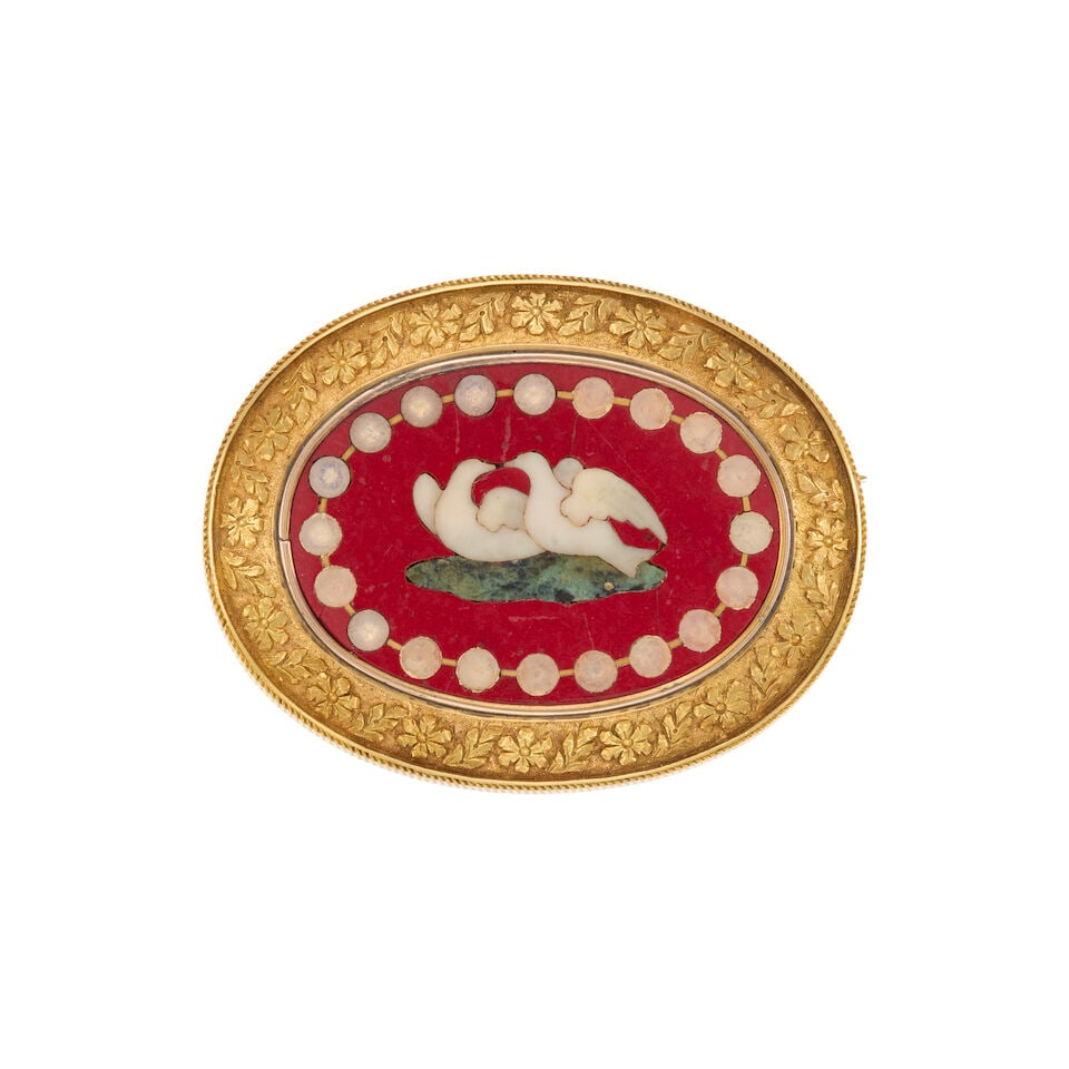 14K GOLD, MOTHER OF PEARL, CORAL, AND HARDSTONE BROOCH: 14K GOLD, MOTHER OF PEARL, CORAL, AND HARDSTONE BROOCH • 14K yellow gold • Coral and hardstone inlay design • Mother of pearl backing • Measures 1 15/16 in. x 1 1/2