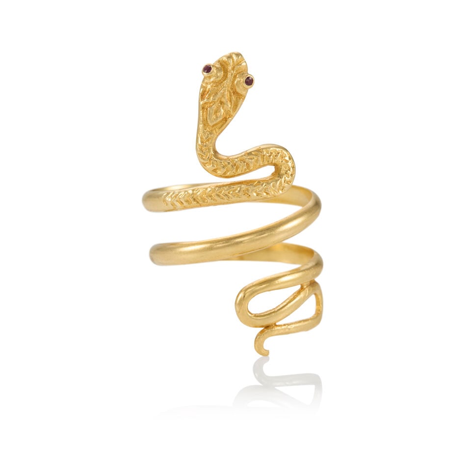 18K GOLD SNAKE RING: 18K GOLD SNAKE RING • 18k yellow gold • 2 round rubies measuring approximately 1.0mm in diameter • Size 9 1/2 (adjustable) • Estimated gross weight: 9.1 grams Footnotes: Overal