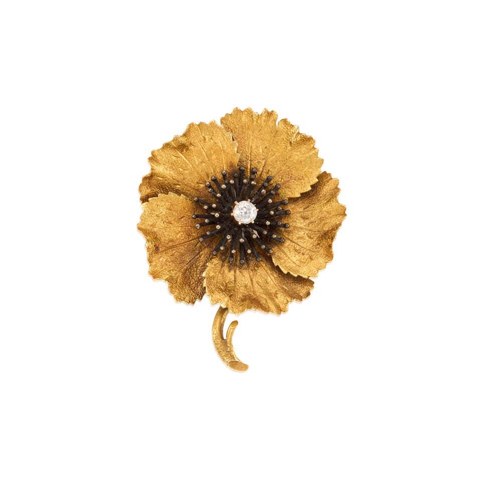 GOLD AND DIAMOND FLOWER BROOCH: GOLD AND DIAMOND FLOWER BROOCH • 12K, 18K, and 20K yellow gold • One round diamond weighing approximately 0.15 carat total • Measures 1 1/2 in. x 1 1/4 in. • Estimated gross