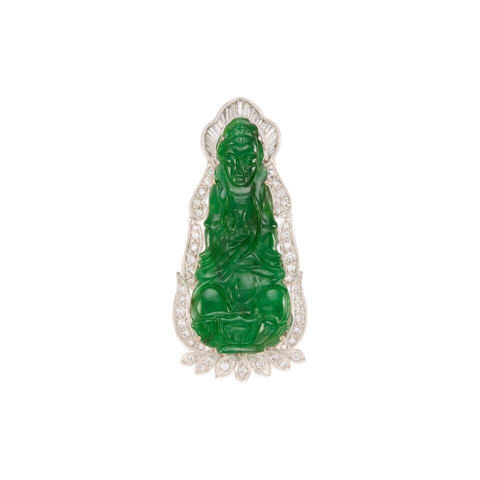 18K GOLD, JADE, AND DIAMOND PENDANT: 18K GOLD, JADE, AND DIAMOND PENDANT • 18K white gold • One carved jade measuring approximately 37.30mm x 11.50mm x depth cannot be determined due to setting • Numerous baguette
