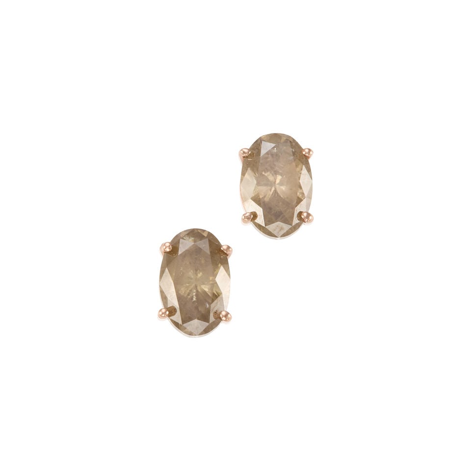 14K GOLD AND DIAMOND EARRINGS: 14K GOLD AND DIAMOND EARRINGS • 14K rose gold • Two oval shaped diamonds measuring approximately 10.94mm x 7.42mm x depth cannot be determined due to the setting • Measures 1/2 in.
