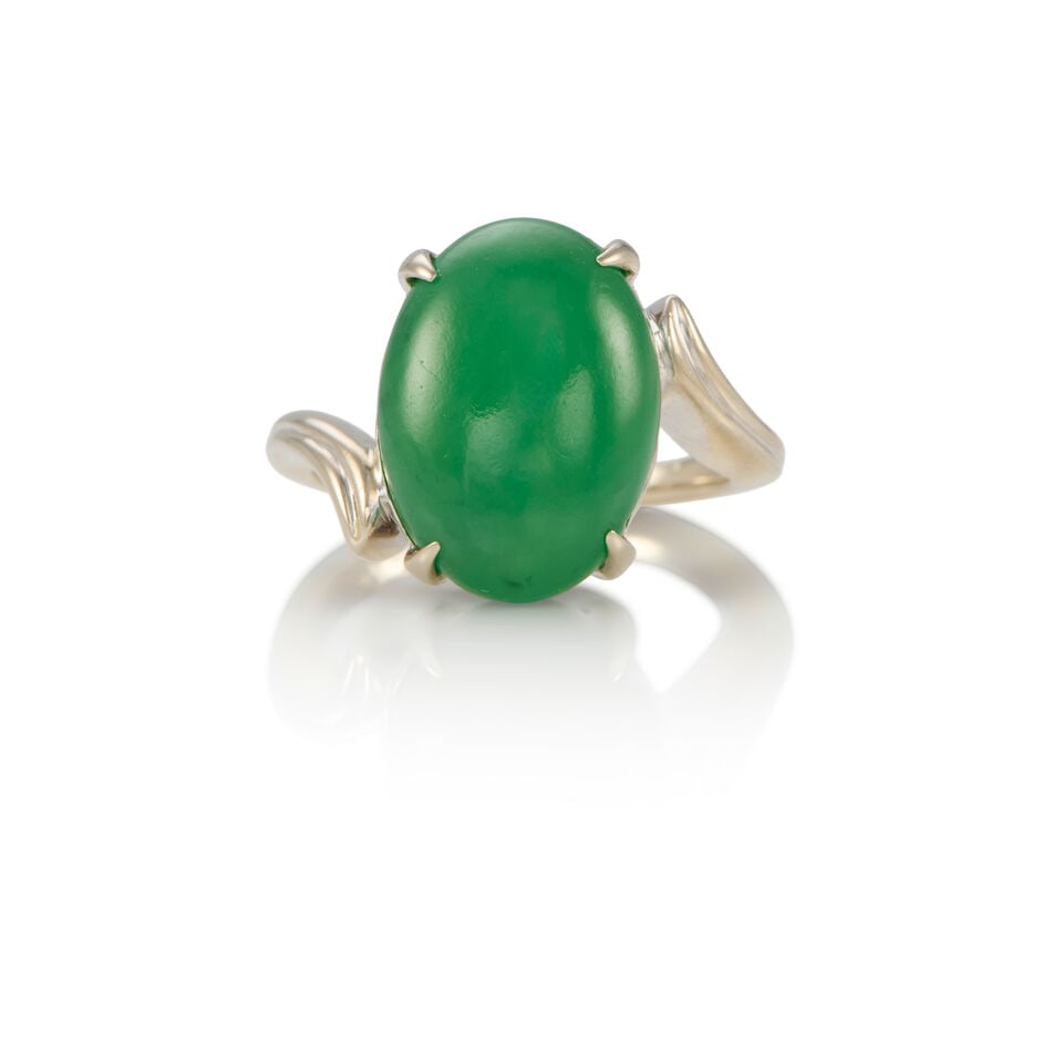 14K GOLD AND JADE RING WITH GIA REPORT: 14K GOLD AND JADE RING WITH GIA REPORT • 14K white gold • One oval double cabochon jade measuring 14.40mm x 10.42mm x 6.04mm • Accompanied by GIA jade report number 5202184372 dated 