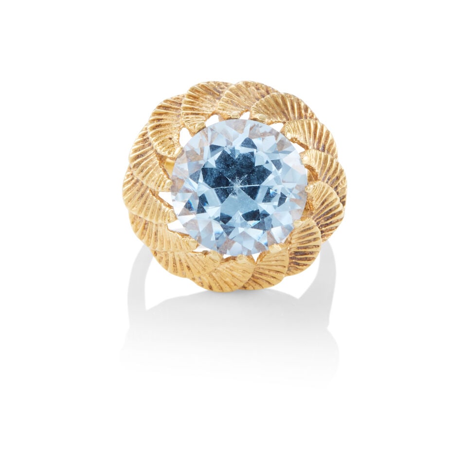 18K GOLD AND SYNTHETIC SPINEL RING: 18K GOLD AND SYNTHETIC SPINEL RING • 18K yellow gold • One round shaped synthetic spinel measuring approximately 12.37mm x 12.38mm x 7.72mm • Size 6 1/4 • Estimated gross