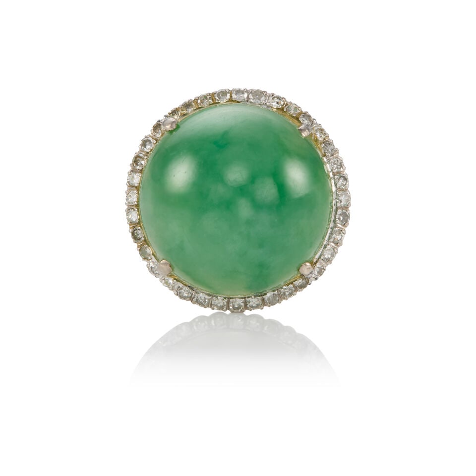 10K GOLD, JADE, AND DIAMOND RING WITH GIA REPORT: 10K GOLD, JADE, AND DIAMOND RING WITH GIA REPORT • 10K white gold • One cabochon jade measuring 19.58mm x 19.63mm x 8.56mm • Numerous round brilliant diamonds weighing approximately