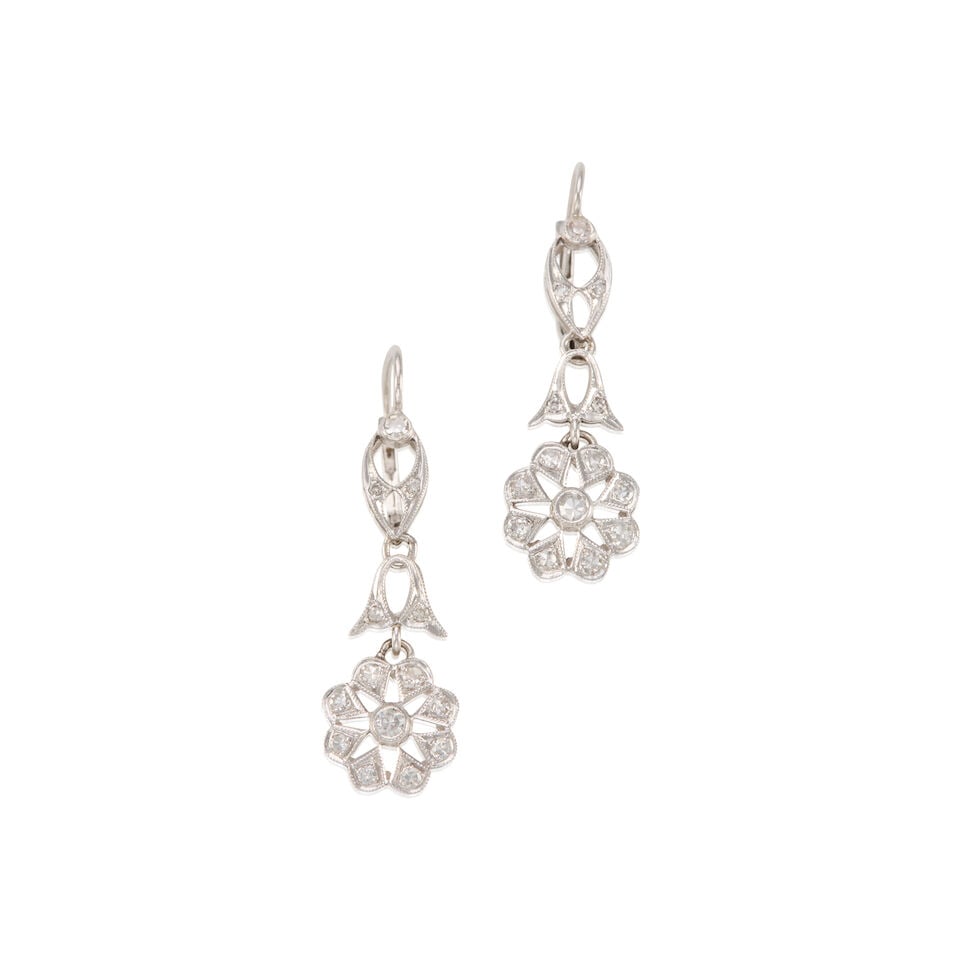 14K GOLD AND DIAMOND EARRINGS: 14K GOLD AND DIAMOND EARRINGS • 14K white gold • Numerous round shaped diamonds weighing approximately 0.30 carat total • Measures 1 1/4 in. x 1/2 in. • Estimated gross