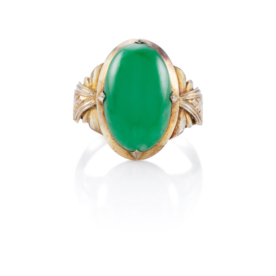 10K GOLD AND JADE RING WITH GIA REPORT: 10K GOLD AND JADE RING WITH GIA REPORT • 10K yellow gold • One oval shaped cabochon jade measuring 16.00mm x 9.95mm x 3.49mm • Accompanied by GIA jade report number 2205184374 dated