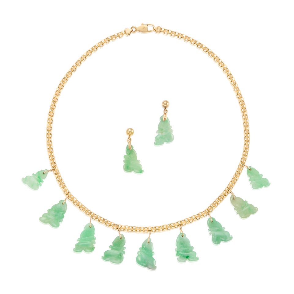 14K GOLD AND JADE SET: 14K GOLD AND JADE SET • Pair of 14K yellow gold earrings with two carved and drilled jade pieces, measures 1 in. x 9/16 in. • 14K yellow gold necklace with 9 carved and drilled jade pieces