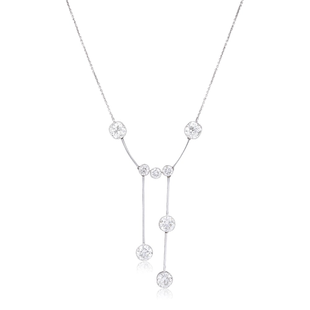 DIAMOND NEGLIGÉE PENDANT NECKLACE, CIRCA 1905: DIAMOND NEGLIGÉE PENDANT NECKLACE, CIRCA 1905 The two old cushion-cut diamond surmounts suspending six old brilliant-cut diamonds, millegrain-set throughout via baton linking, on a fine