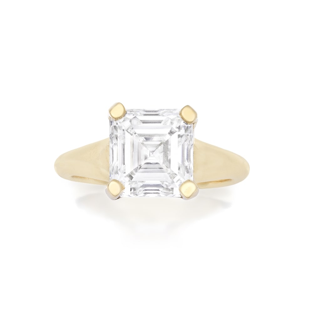 DIAMOND SINGLE-STONE RING: DIAMOND SINGLE-STONE RING The Asscher-cut diamond, weighing 3.00 carats, mounted in 18 carat gold, UK hallmark, ring size I Footnotes: Accompanied by a report from GIA stating that the diamond is E