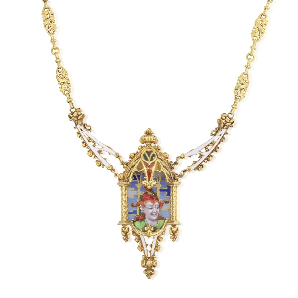 GOTHIC REVIVAL GOLD AND PLIQUE-Á-JOUR ENAMEL PENDANT NECKLACE, CIRCA 1870-1900: GOTHIC REVIVAL GOLD AND PLIQUE-Á-JOUR ENAMEL PENDANT NECKLACE, CIRCA 1870-1900 The ornate Gothic arch with baluster columns, foliate motifs and white enamel detail, set with stained glass,