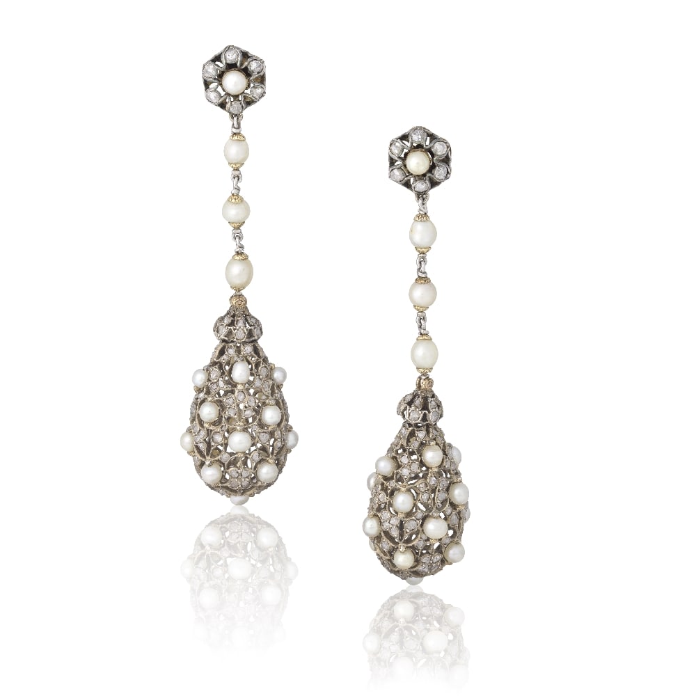 ATTRIBUTED TO MARIO BUCCELLATI: PEARL AND DIAMOND PENDENT EARRINGS, CIRCA 1930: ATTRIBUTED TO MARIO BUCCELLATI: PEARL AND DIAMOND PENDENT EARRINGS, CIRCA 1930 Each pierced and hollow drop of rose-cut diamond quatrefoil and foliate motifs, issuing pearl accents, articulating