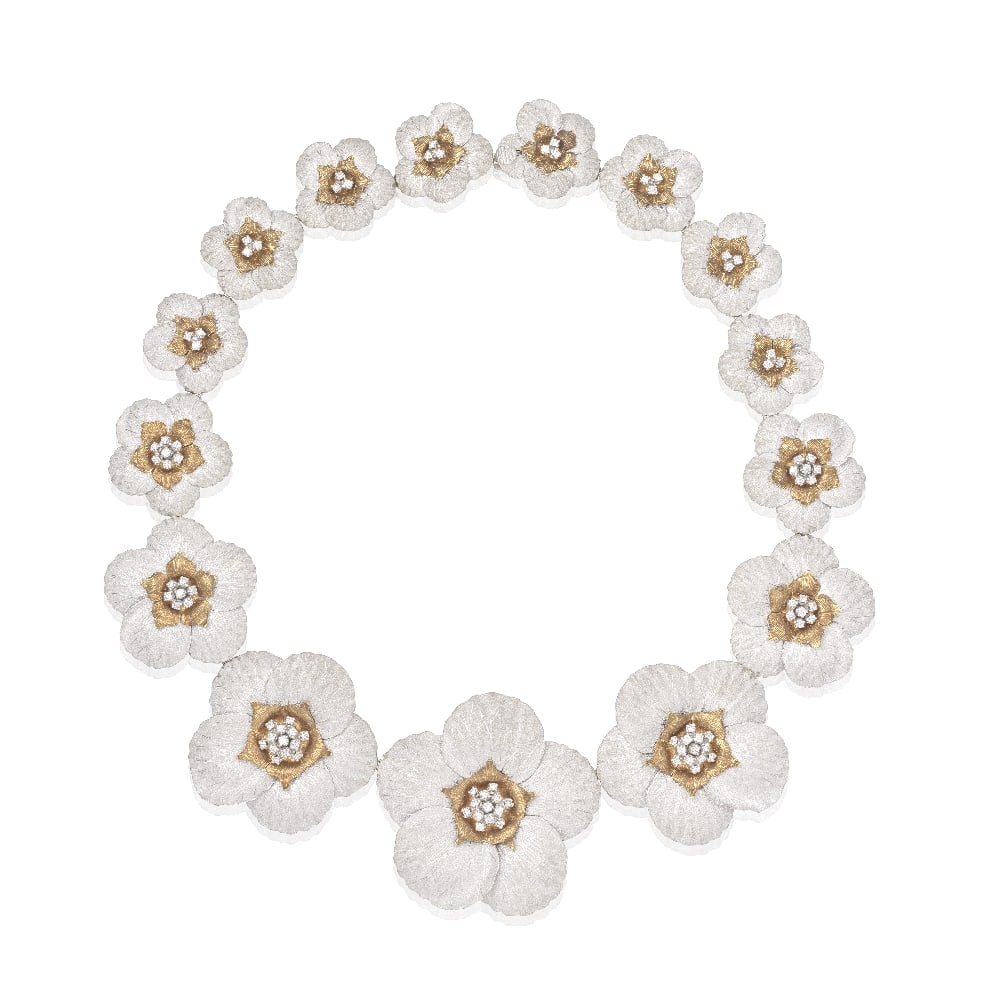 BUCCELLATI: DIAMOND-SET 'MAGNOLIA' NECKLACE: BUCCELLATI: DIAMOND-SET 'MAGNOLIA' NECKLACE The bicoloured magnolias graduating in size towards the centre with overlapping petals decorated with segrinato engraving, the centre of each flowerhead