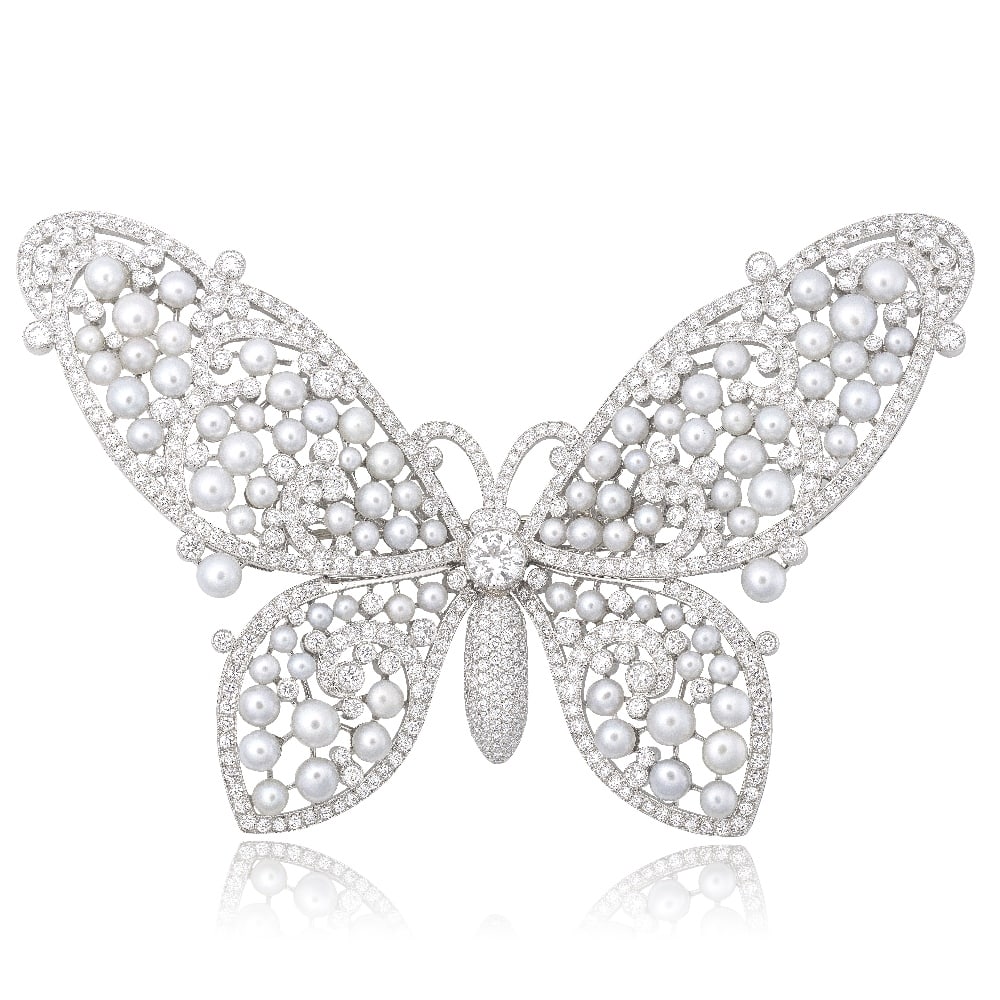 TIFFANY: DIAMOND AND KESHI PEARL BUTTERFLY BROOCH, 2012: TIFFANY: DIAMOND AND KESHI PEARL BUTTERFLY BROOCH, 2012 The body of bombé form between wings of openwork design with scroll motifs, pavé and collet-set throughout with brilliant-cut