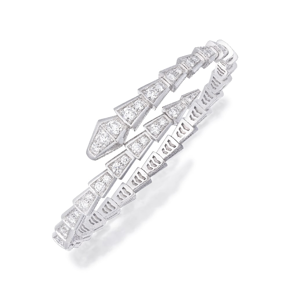 BULGARI: DIAMOND 'SERPENTI VIPER' BANGLE: BULGARI: DIAMOND 'SERPENTI VIPER' BANGLE Designed as a serpent set throughout with brilliant-cut diamonds, mounted in 18 carat white gold, signed Bulgari, maker's mark SB, UK hallmark, convention