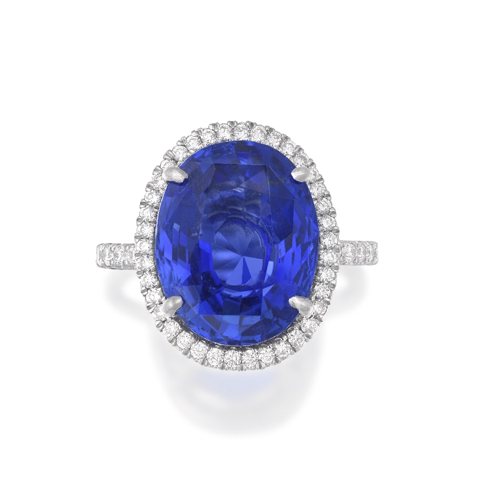 BOODLES: SAPPHIRE AND DIAMOND RING: BOODLES: SAPPHIRE AND DIAMOND RING The oval-cut sapphire, weighing 8.33 carats, within a fine brilliant-cut pavé-set surround, band and gallery similarly set, signed Boodles, ring size H½ (h