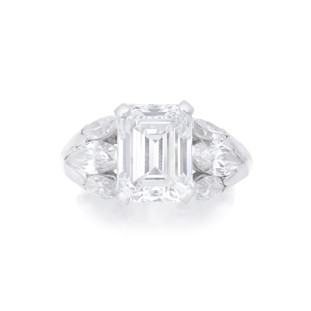 DIAMOND SINGLE-STONE RING: DIAMOND SINGLE-STONE RING The step-cut diamond, weighing 3.22 carats, between graduating marquise-cut diamond shoulders, ring size N Footnotes: Accompanied by a report from GIA stating that the