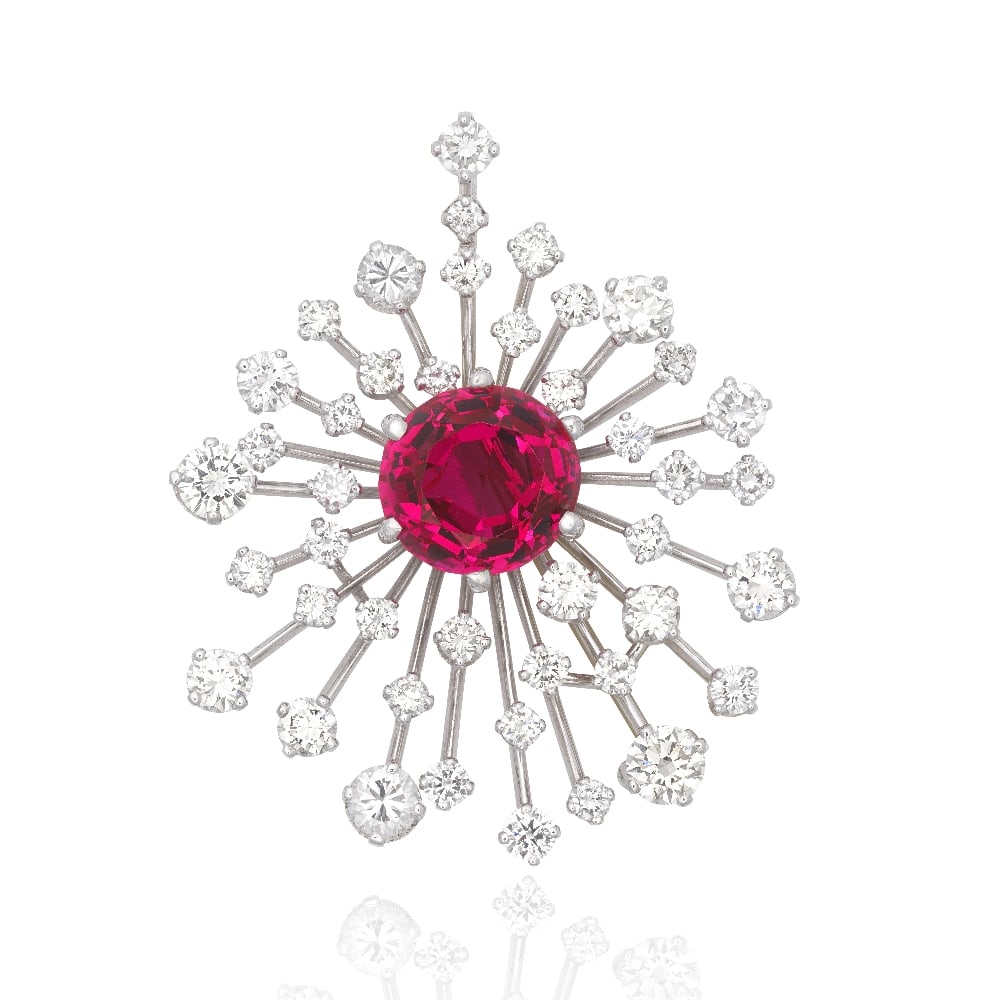 SPINEL AND DIAMOND BROOCH/PENDANT: SPINEL AND DIAMOND BROOCH/PENDANT The circular-cut spinel, weighing 6.37 carats, within a radiating knifewire surround, issuing brilliant-cut diamonds, diamonds approximately 3.00 carats total,