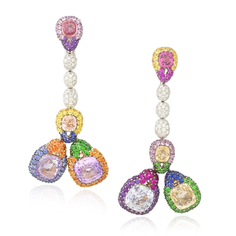 DE GRISOGONO: SAPPHIRE, GARNET AND DIAMOND PENDENT EARRINGS: DE GRISOGONO: SAPPHIRE, GARNET AND DIAMOND PENDENT EARRINGS Each articulating drop set with four cushion-shaped vari-coloured sapphires, within halo surrounds, pavé-set with circular-cut vari