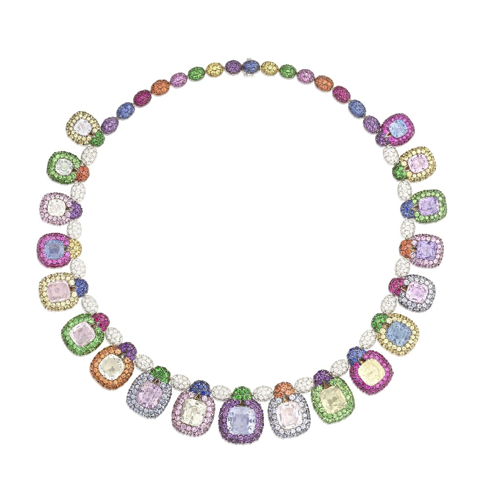 DE GRISOGONO: SAPPHIRE, GARNET AND DIAMOND NECKLACE: DE GRISOGONO: SAPPHIRE, GARNET AND DIAMOND NECKLACE Pavé-set throughout with circular-cut vari-coloured sapphires and garnets, issuing nineteen cushion-shaped vari-coloured sapphires, graduating 