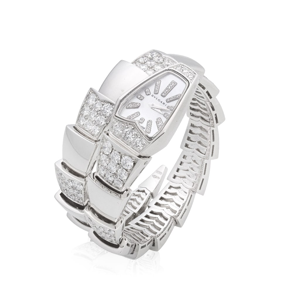 BULGARI: DIAMOND 'SERPENTI SPIGA' BRACELET/WATCH: BULGARI: DIAMOND 'SERPENTI SPIGA' BRACELET/WATCH Designed as a stylised serpent with a mother-of pearl dial and single-cut diamond hourmarkers, the bracelet of sprung design alternating with polished