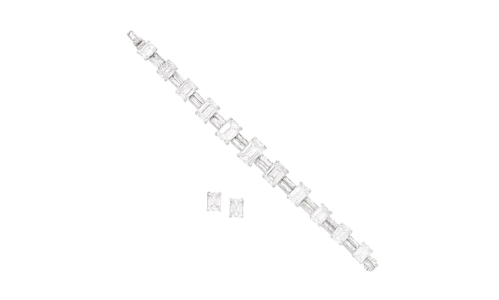 ALDAO: DIAMOND BRACELET AND EARSTUDS (2): ALDAO: DIAMOND BRACELET AND EARSTUDS The bracelet set throughout with step-cut diamonds, graduating in size towards the centre and weighing (from clasp to tongue): 1.59, 2.08, 2.15, 2.59, 3.56, 4.19,