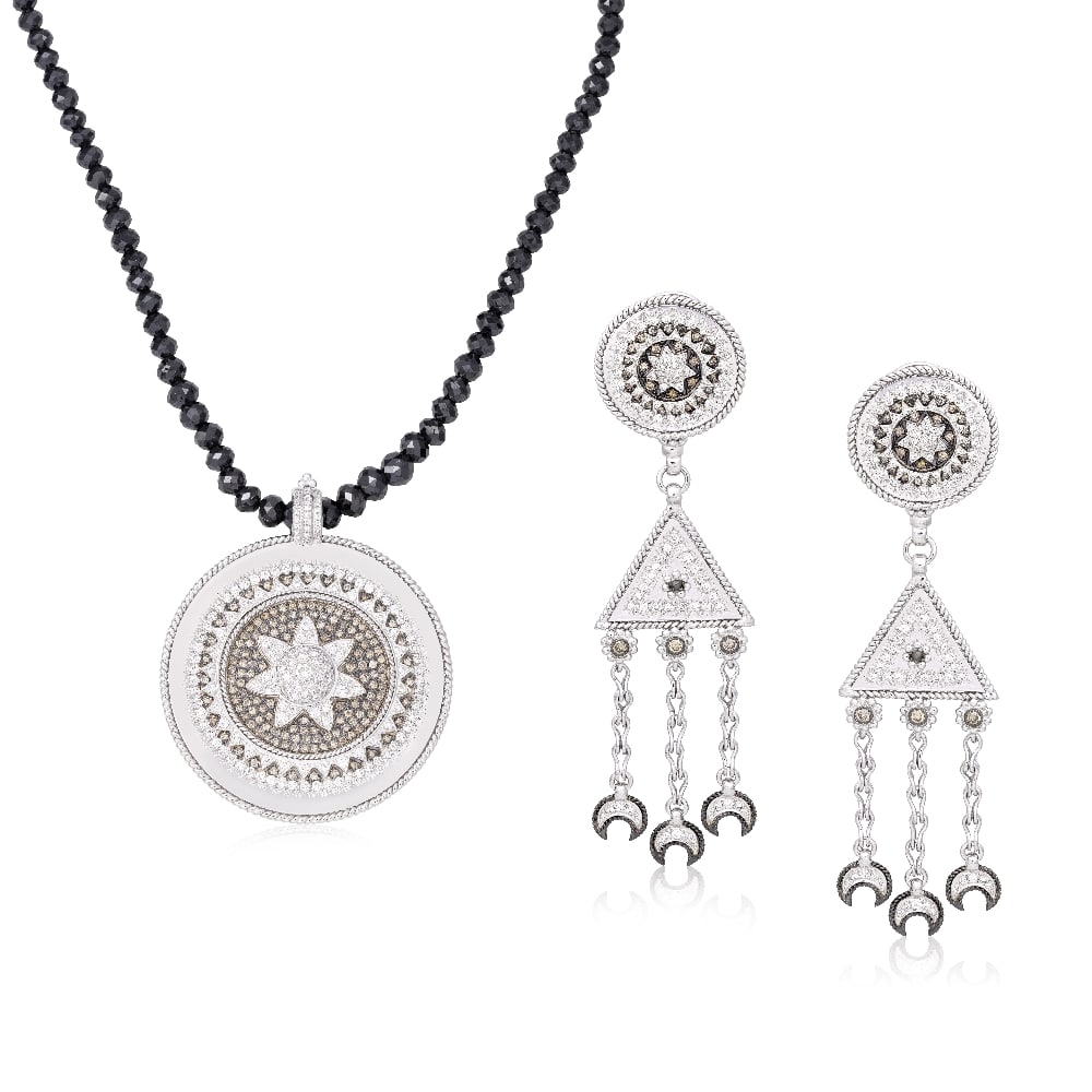 COLOURED DIAMOND NECKLACE AND EARRING SUITE: COLOURED DIAMOND NECKLACE AND EARRING SUITE The brilliant-cut diamond star motif, within a radiating surround of pavé-set brilliant-cut diamonds and similarly-cut diamonds of brown tint, to a