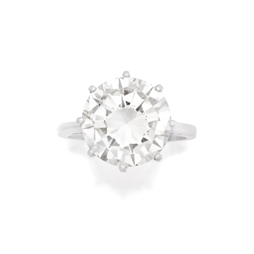 DIAMOND SINGLE-STONE RING: DIAMOND SINGLE-STONE RING The brilliant-cut diamond, weighing 6.23 carats, ring size L Footnotes: Please note, this lot has VAT at the prevailing rate on the Hammer Price and Buyer's Premium and