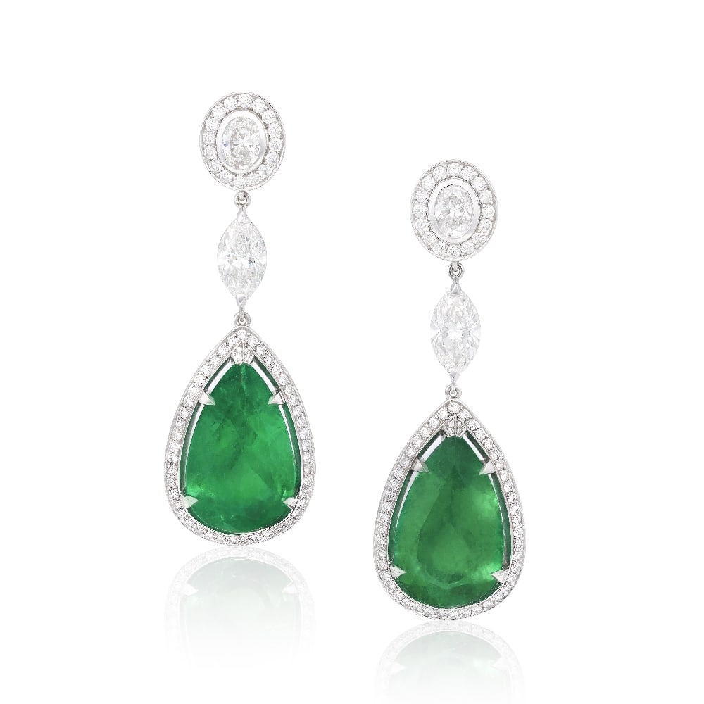 PREVOST: EMERALD AND DIAMOND PENDENT EARRINGS: PREVOST: EMERALD AND DIAMOND PENDENT EARRINGS Each pear-cut emerald, weighing 15.29 and 15.76 carats, within a pavé-set brilliant-cut diamond surround, suspended from a brilliant and oval-cut