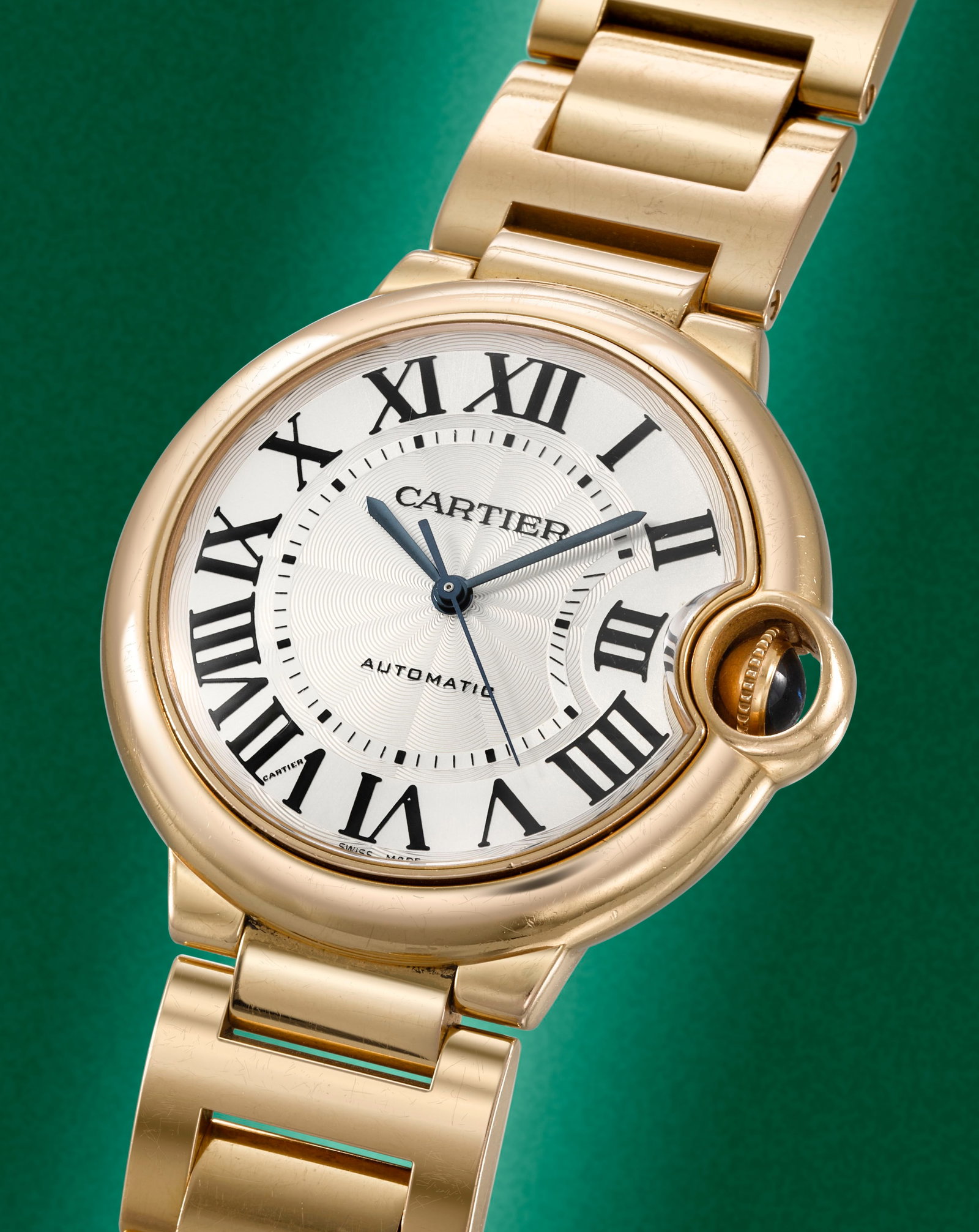 Cartier. An 18K rose gold automatic bracelet watch Ballon Bleu, Ref: 3003, Circa 2011: Cartier. An 18K rose gold automatic bracelet watch Model: Ballon Bleu Reference: 3003 Date: Circa 2011 Movement: 25-jewel Cal.076 automatic Dial: Silvered with guilloché engraved centre, black Ro