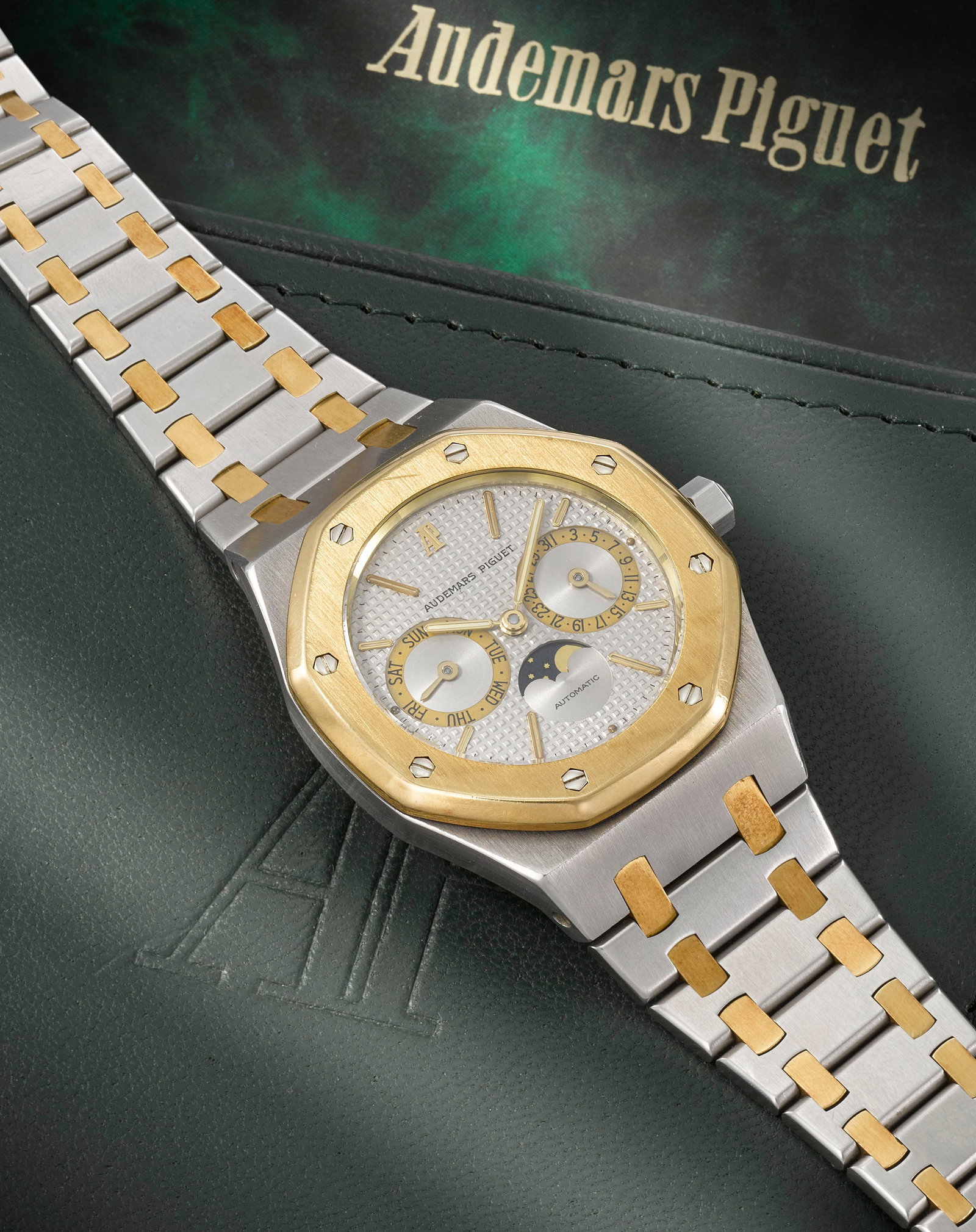 Audemars Piguet. A fine and rare stainless steel and gold automatic calendar bracelet watch with... (1 of 1)