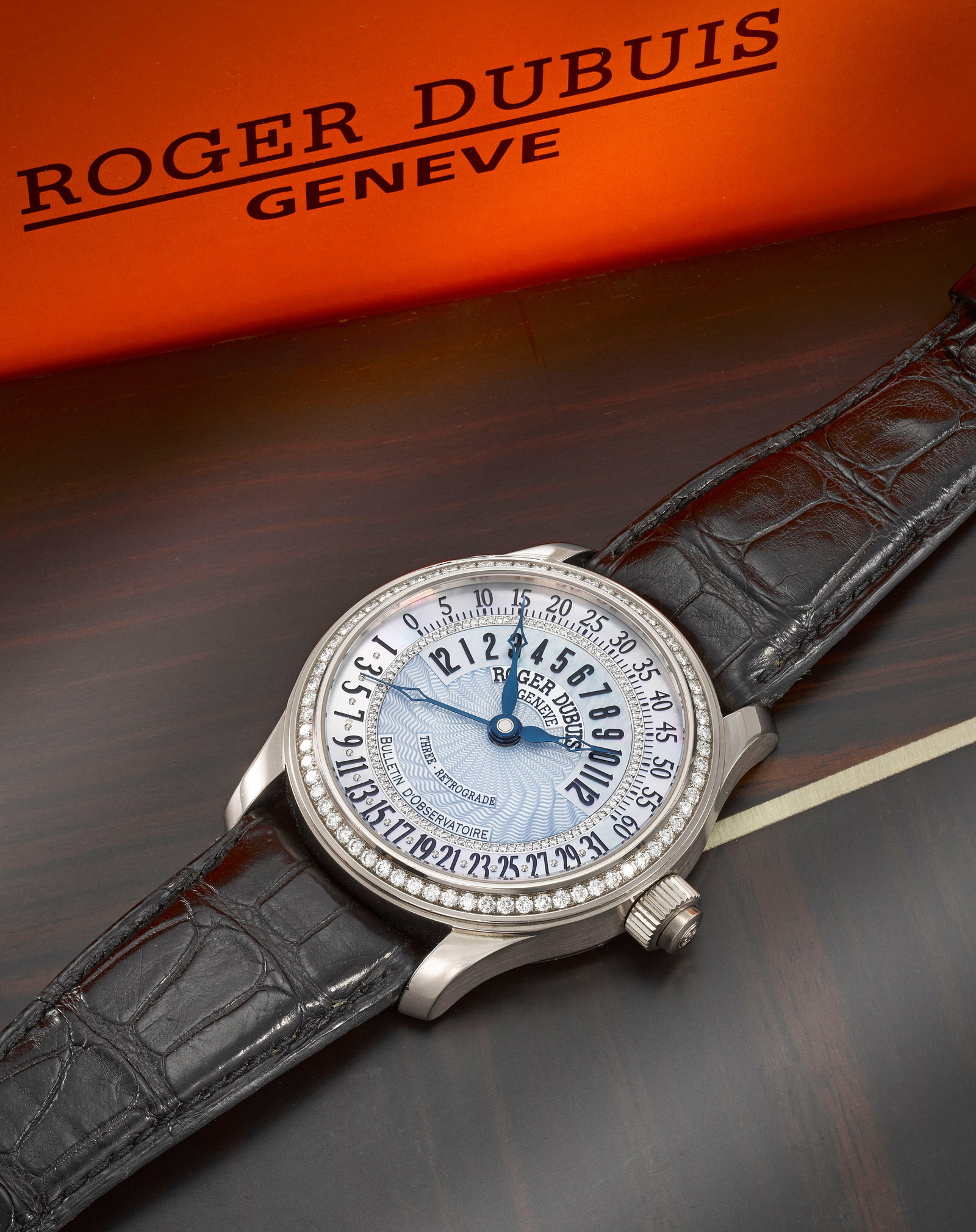 Roger Dubuis. A rare and unusual Limited Edition 18K white gold diamond set automatic wristwatch...: Roger Dubuis. A rare and unusual Limited Edition 18K white gold diamond set automatic wristwatch with mother of pearl dial and retrograde hours, minutes and date Model: Three-Retrograde, No.02/28 Date