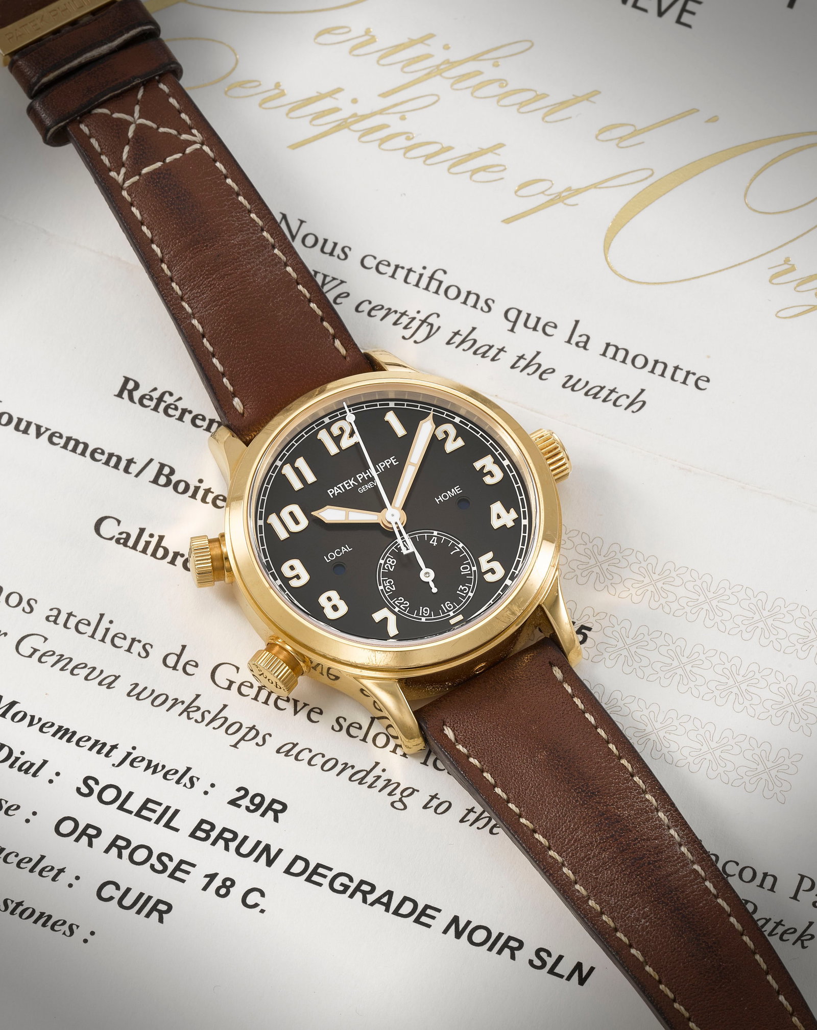 Patek Philippe. A fine 18K rose gold automatic calendar wristwatch with dual time indication Ca...: Patek Philippe. A fine 18K rose gold automatic calendar wristwatch with dual time indication Model: Calatrava Pilot Travel Time Reference: 7234R Date: Purchased 29th December 2019 Movement: 29-jewel C