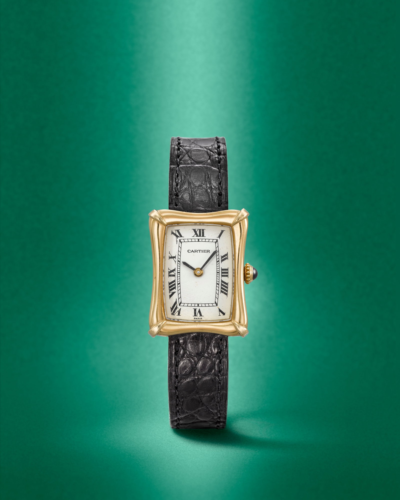 Cartier. A fine and rare mid-size 18K gold manual wind wristwatch Bamboo Coussin, London Impor...: Cartier. A fine and rare mid-size 18K gold manual wind wristwatch Model: Bamboo Coussin Date: London Import mark for 1974 Movement: 17-jewel manual wind Dial: White, black Roman numeral hour markers, 