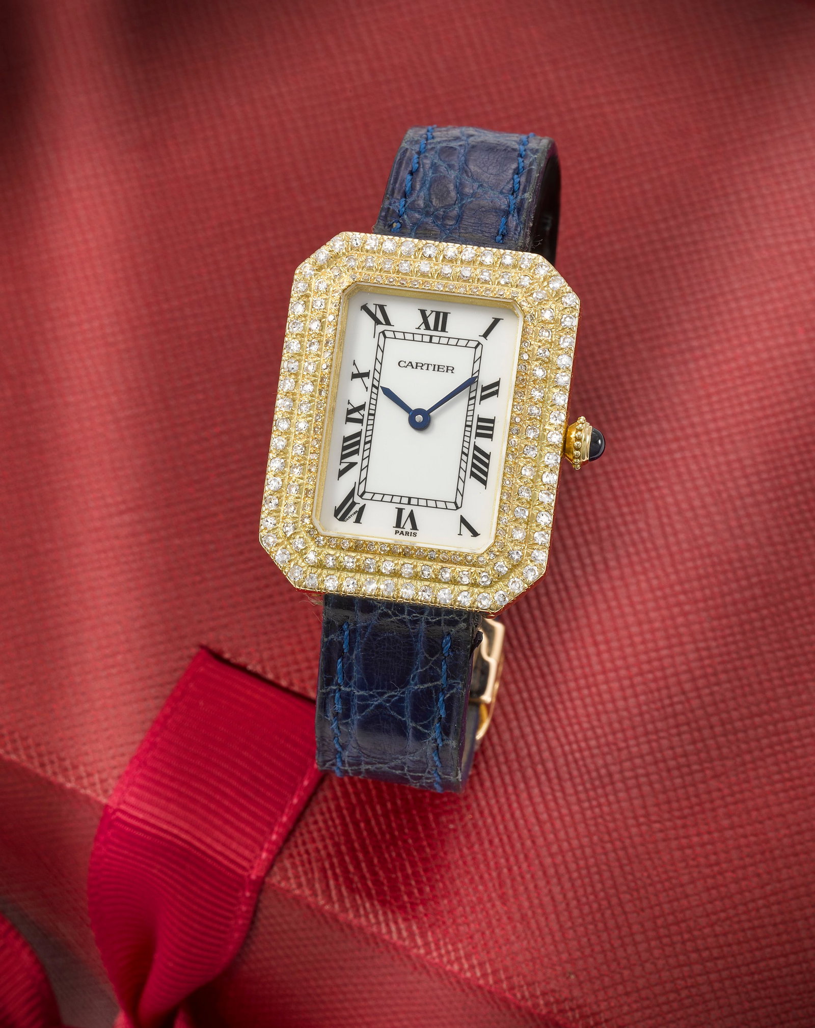 Cartier. A mid-size recently serviced fine and rare 18K gold diamond set manual wind wristwatch ... (1 of 1)