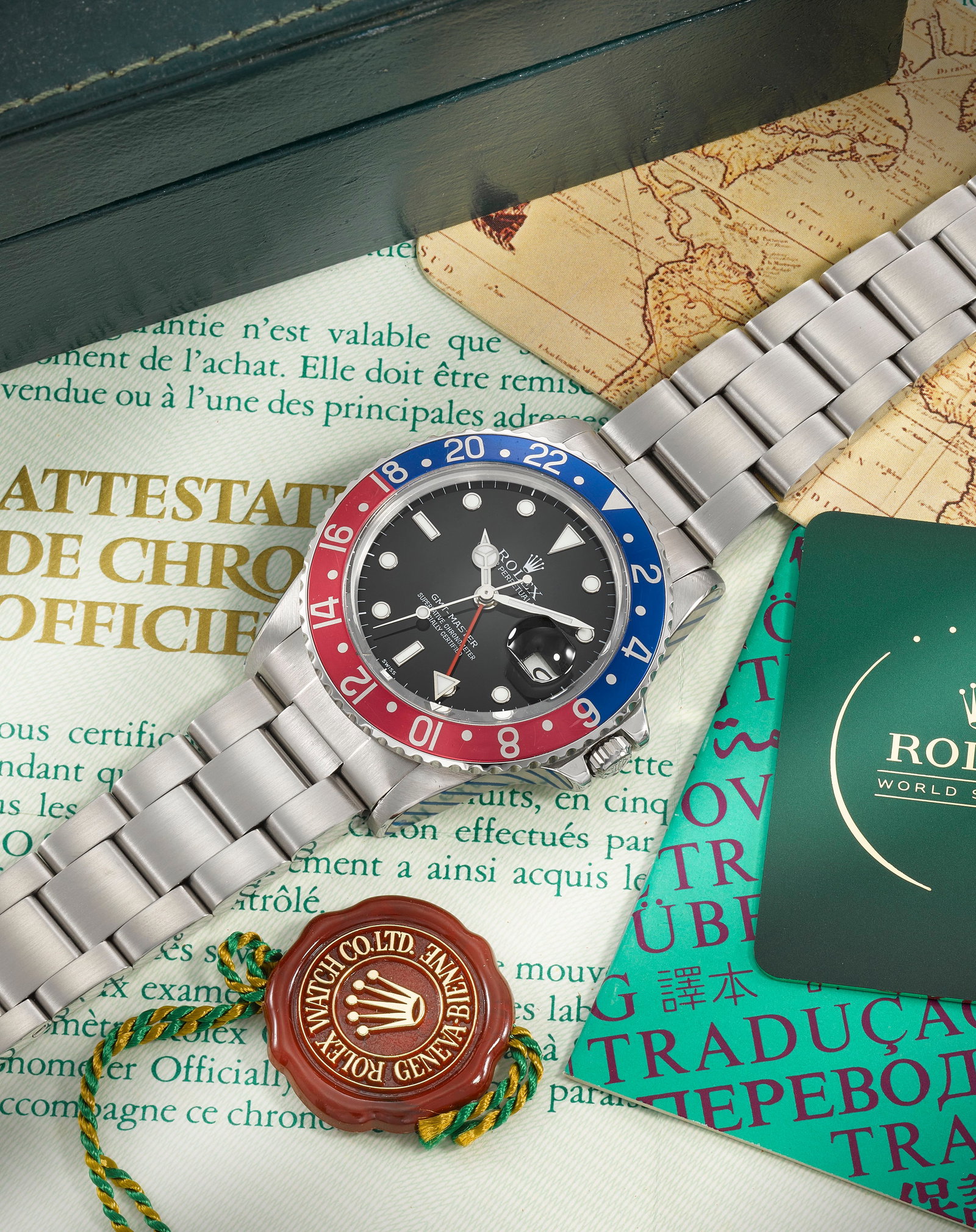 Rolex. A transitional stainless steel automatic calendar bracelet watch with dual time zone GMT...: Rolex. A transitional stainless steel automatic calendar bracelet watch with dual time zone Model: GMT Master Reference: M16750 Date: Purchased 19th February 1984 Movement: 27-jewel Cal.3075 automatic