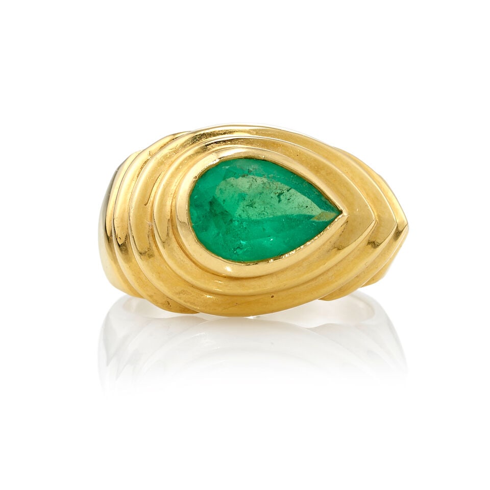18K GOLD AND EMERALD RING: 18K GOLD AND EMERALD RING • 18K yellow gold • One pear shaped emerald weighing approximately 1.20 carats total • Size 6 3/4 • Estimated gross weight: 10.2 grams Footnotes: Over