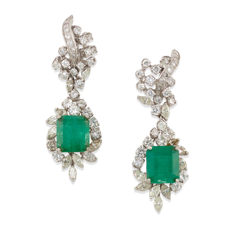 PAIR OF EMERALD AND DIAMOND EARRINGS: PAIR OF EMERALD AND DIAMOND EARRINGS • White precious metal alloy composed primarily of silver with palladium and minor gold content • Numerous round diamonds weighing approximately 1.45