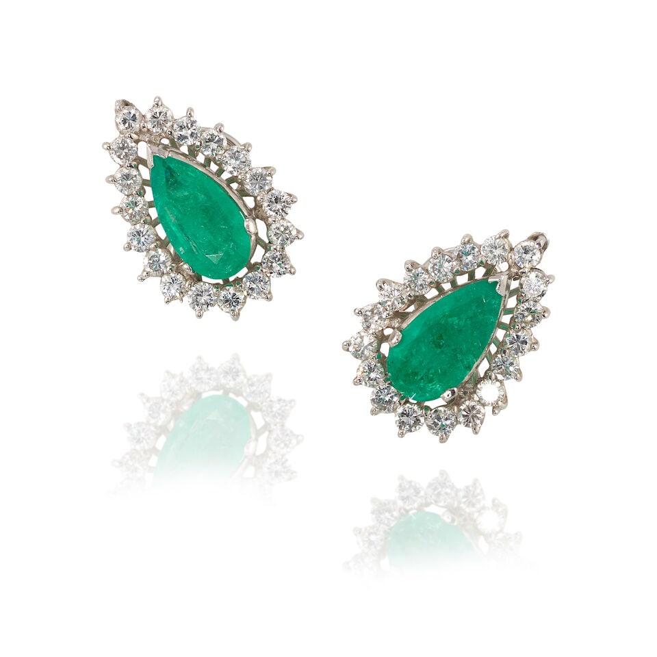 PAIR OF EMERALD AND DIAMOND EARRINGS: PAIR OF EMERALD AND DIAMOND EARRINGS • White precious metal alloy composed primarily of silver with palladium and minor gold content • Numerous round diamonds weighing approximately 2.45