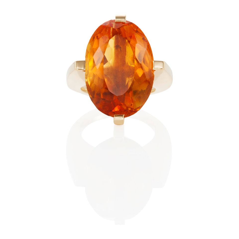 14K GOLD AND CITRINE RING: 14K GOLD AND CITRINE RING • 14k yellow gold • 1 oval citrine weighing approximately 15.00 - 15.10 carats total • Size 5 1/4 • Estimated gross weight: 14.1