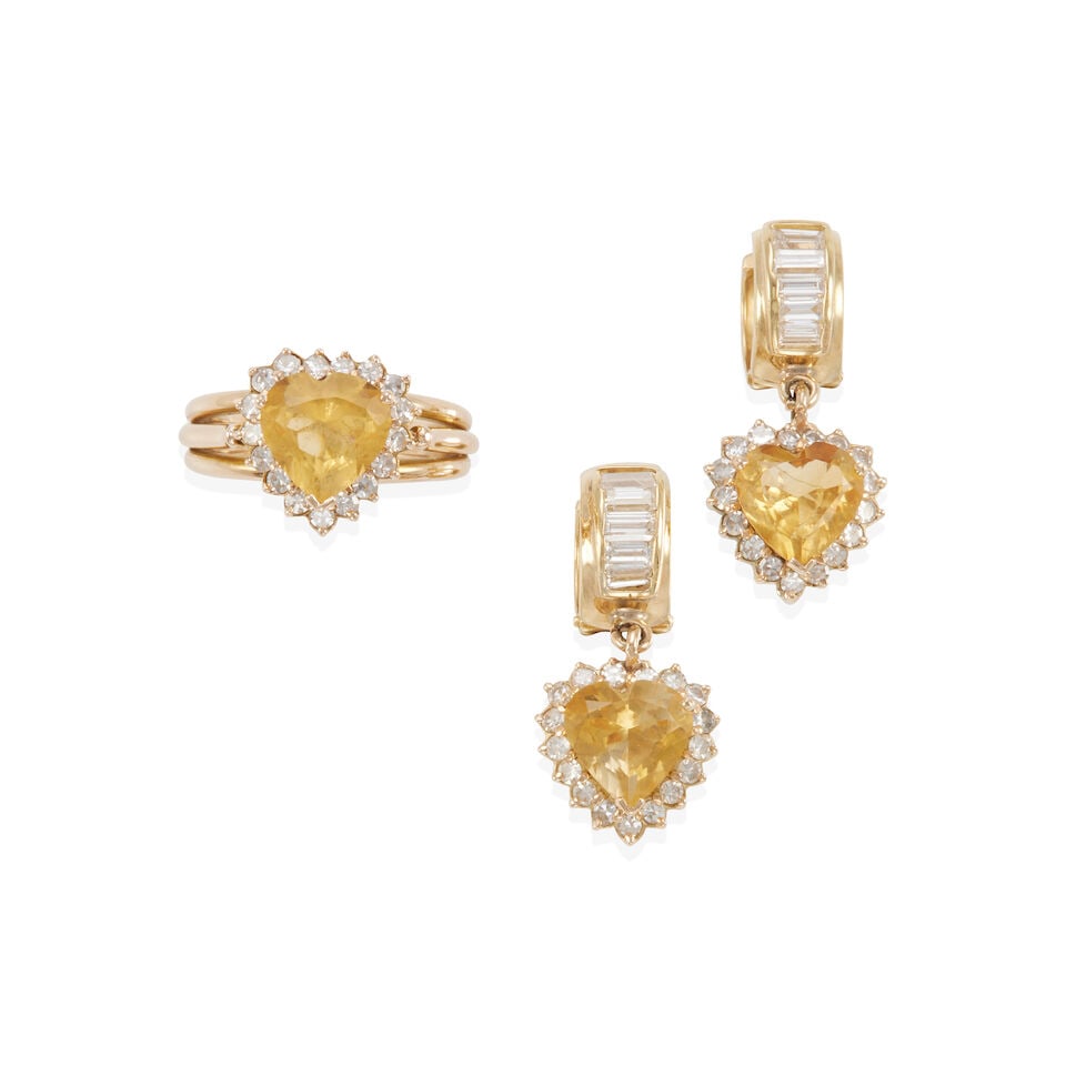 CITRINE AND DIAMOND SET: CITRINE AND DIAMOND SET • One ring of 14k yellow gold with heart-shaped citrine weighing approximately 1.90 - 2.00 carat and numerous round diamonds weighing approximately 0.25 - 0.35 carat