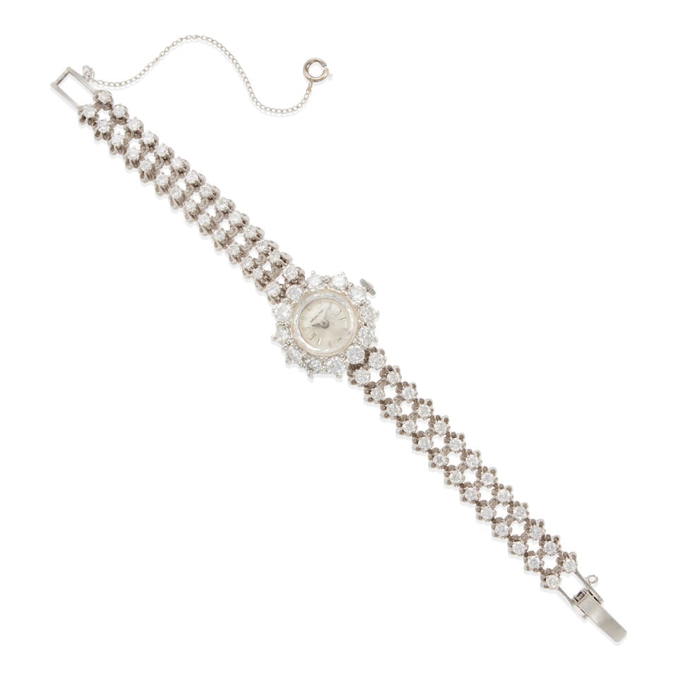 HAMILTON:14K GOLD AND DIAMOND WRISTWATCH: HAMILTON:14K GOLD AND DIAMOND WRISTWATCH • 14k white gold • Dial signed Hamilton • Numerous round diamonds weighing approximately 7.15 - 7.25 carats total • Mechanical